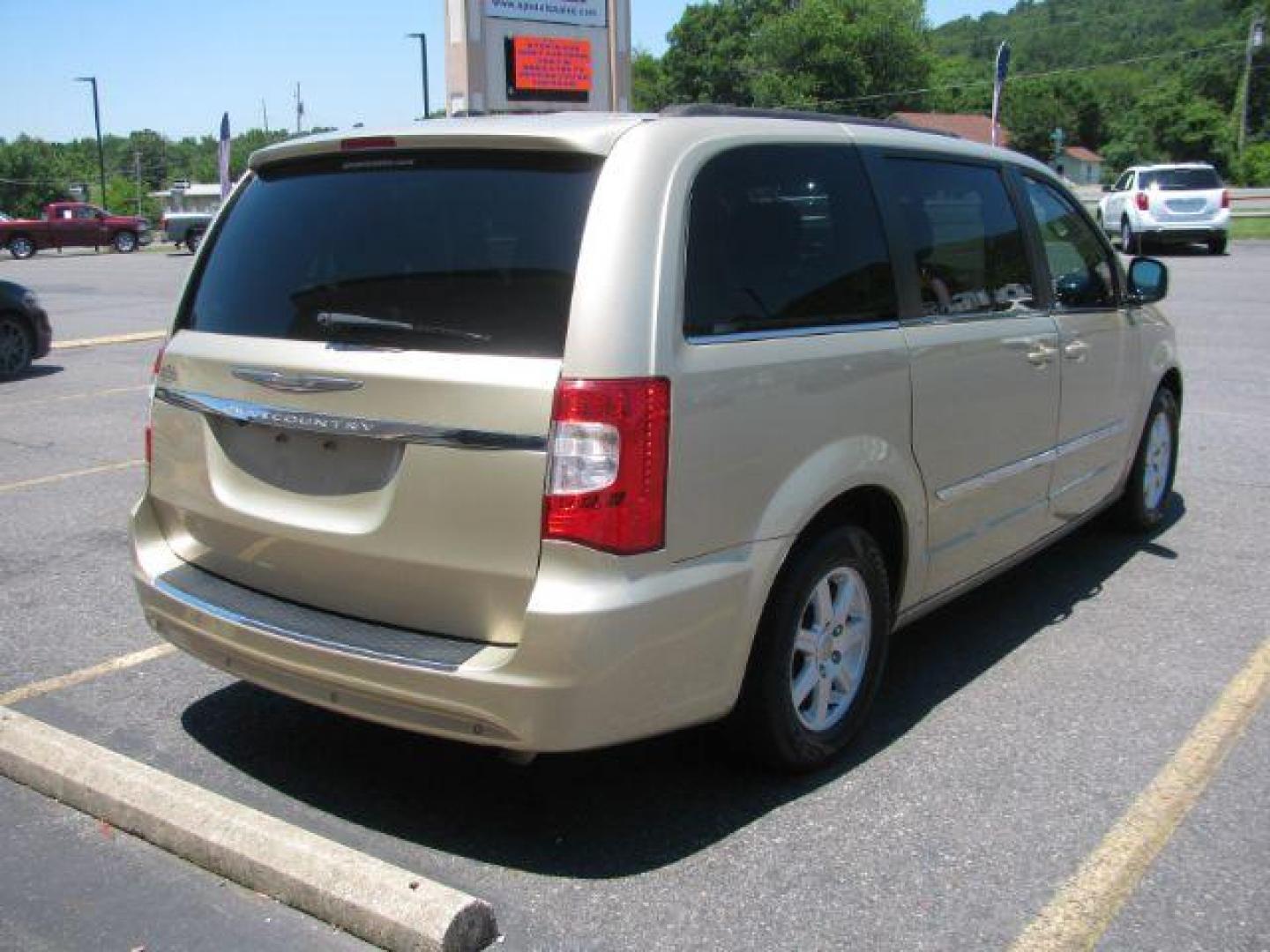 2011 Gold Chrysler Town and Country Touring (2A4RR5DG0BR) with an 3.6L V6 DOHC 24V engine, 6-Speed Automatic transmission, located at 2443 Albert Pike, Hot Springs, AR, 71913, (501) 623-6255, 34.492222, -93.109993 - Photo#3