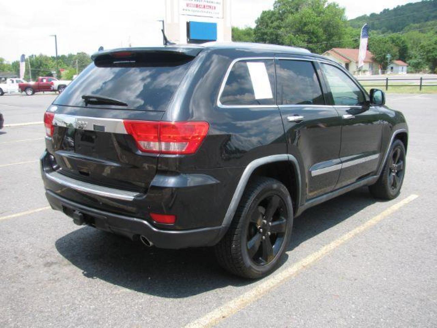 2012 Black Jeep Grand Cherokee Overland 2WD (1C4RJECG2CC) with an 3.6L V6 DOHC 24V engine, 5-Speed Automatic transmission, located at 2443 Albert Pike, Hot Springs, AR, 71913, (501) 623-6255, 34.492222, -93.109993 - Photo#2