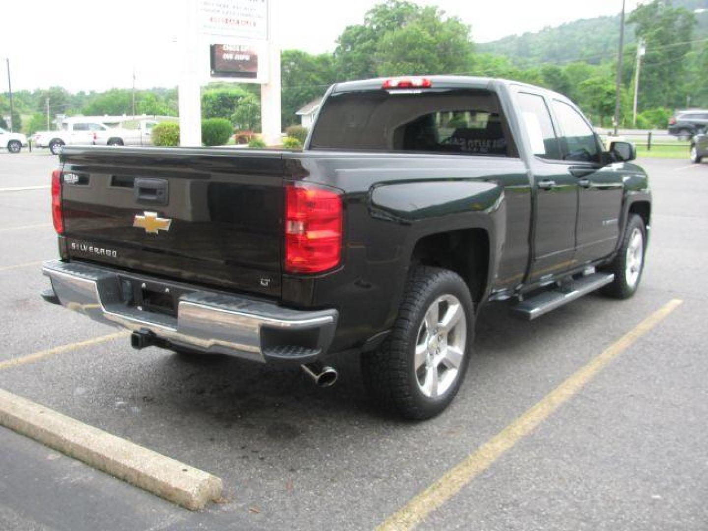 2015 Black Chevrolet Silverado 1500 EXTENDED CAB PICKUP 4-DR (1GCRCREC4FZ) with an 5.3L V8 OHV 16V engine, 6-Speed Automatic transmission, located at 2443 Albert Pike, Hot Springs, AR, 71913, (501) 623-6255, 34.492222, -93.109993 - Photo#4