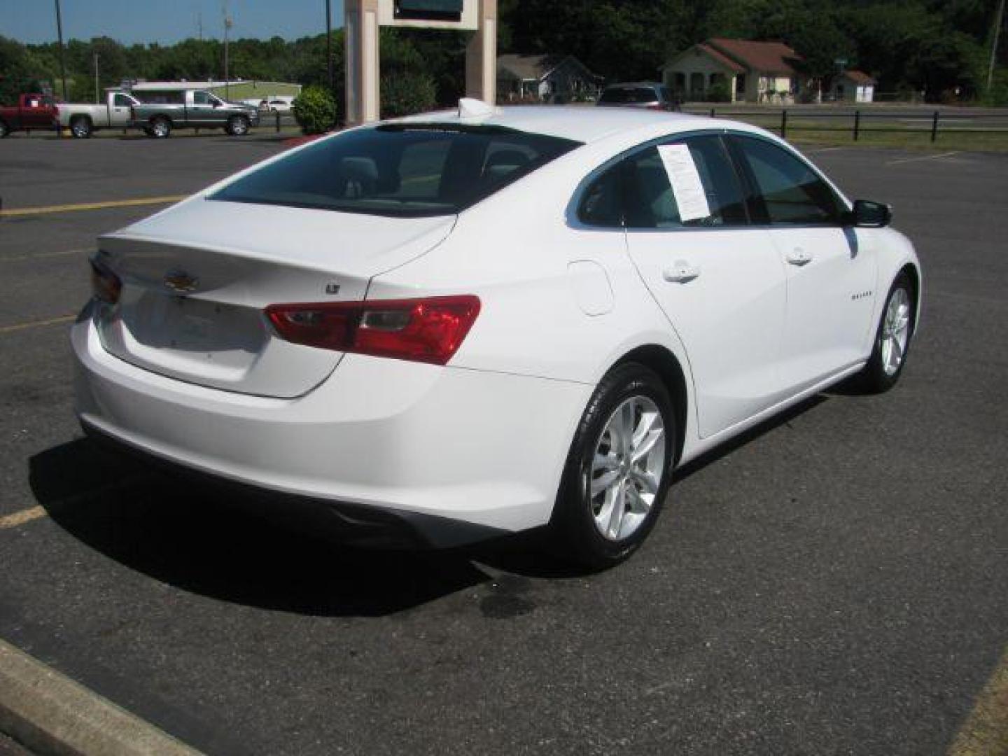 2017 White Chevrolet Malibu 1LT (1G1ZE5ST4HF) with an 1.5L L4 DOHC 16V engine, 6-Speed Automatic transmission, located at 2443 Albert Pike, Hot Springs, AR, 71913, (501) 623-6255, 34.492222, -93.109993 - Photo#2