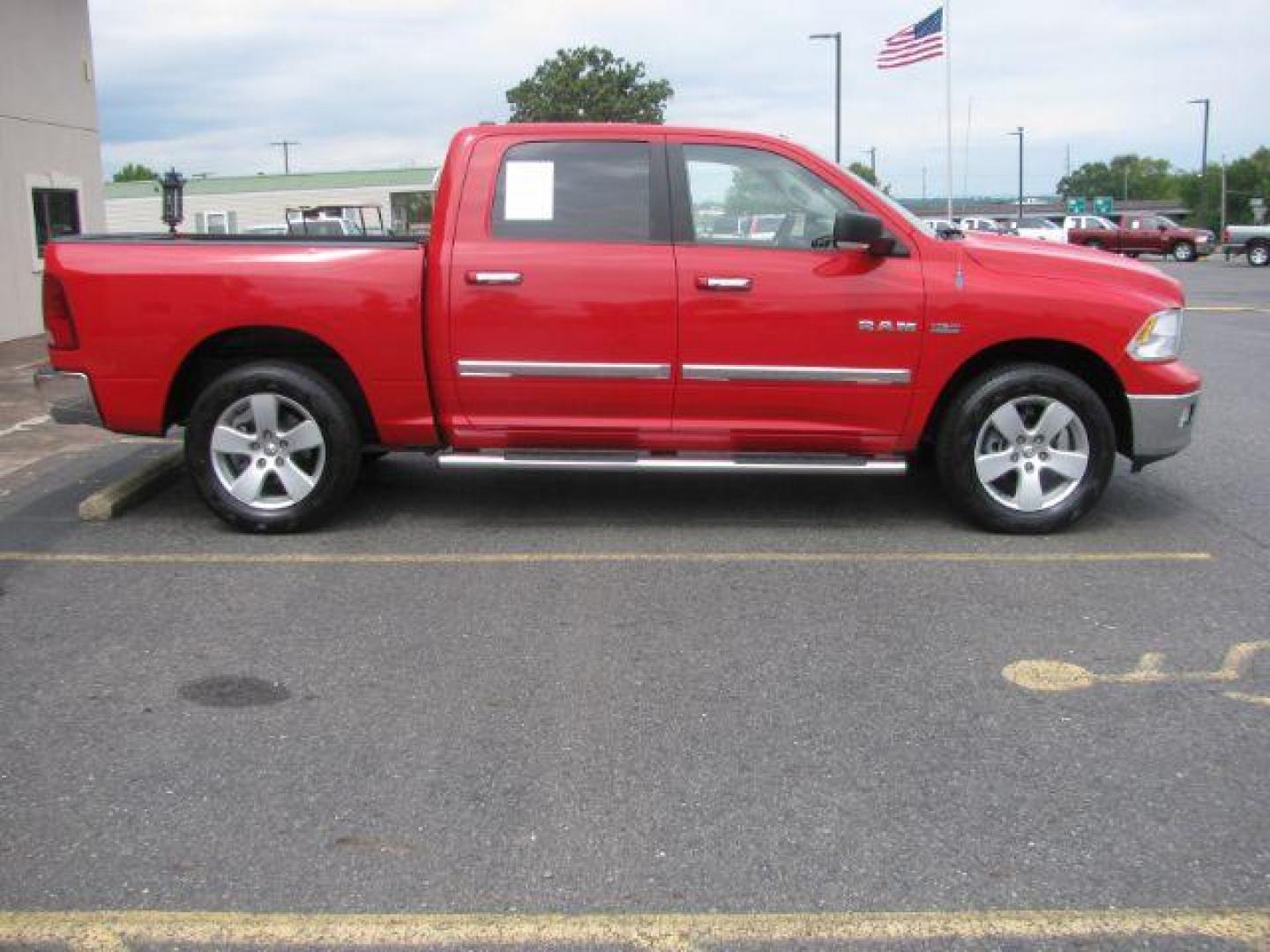 2009 Red Dodge Ram 1500 CREW CAB PICKUP 4-DR (1D3HV13T39J) with an 5.7L V8 OHV 16V engine, 5-Speed Automatic transmission, located at 2443 Albert Pike, Hot Springs, AR, 71913, (501) 623-6255, 34.492222, -93.109993 - Photo#1