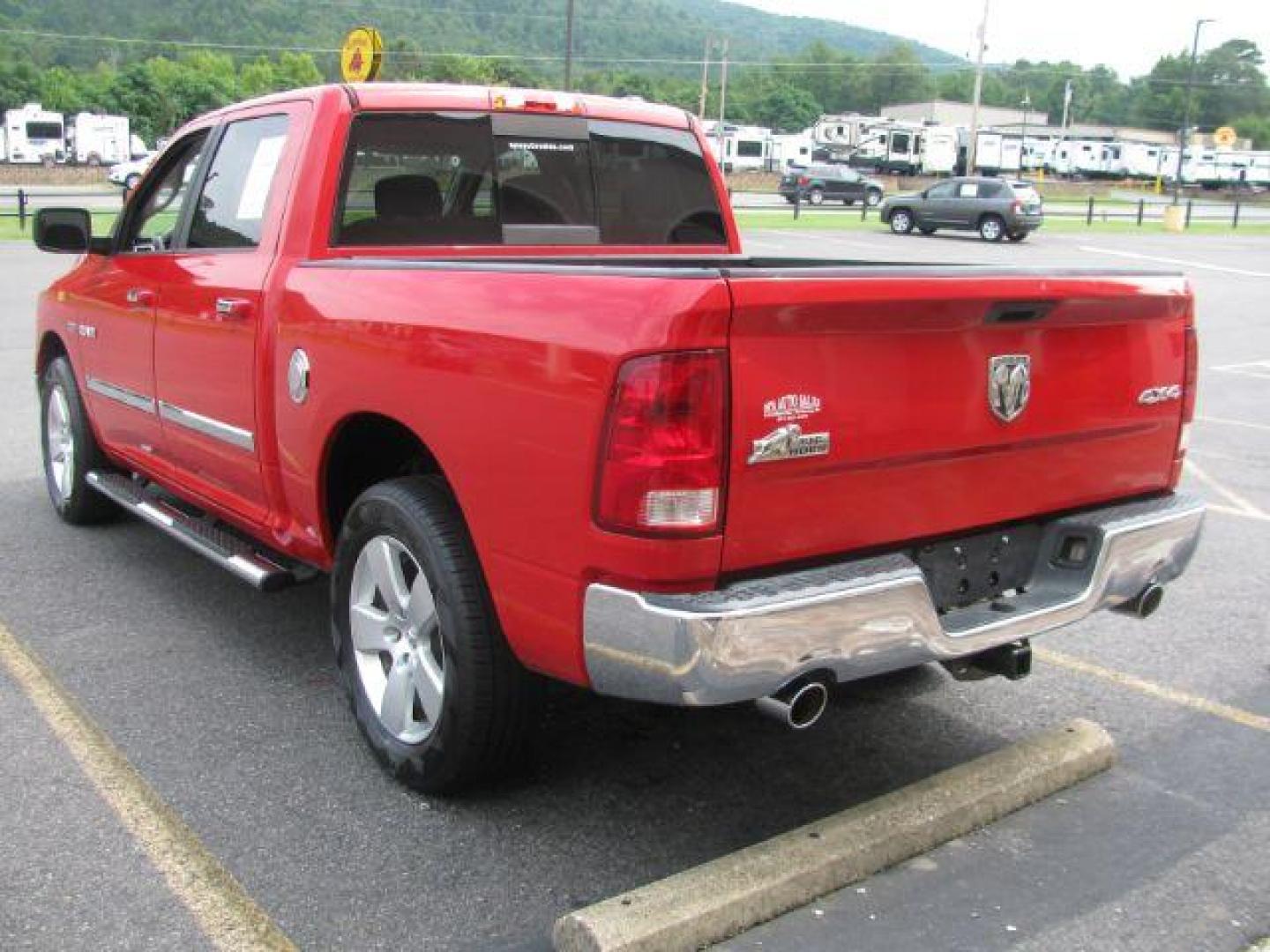 2009 Red Dodge Ram 1500 CREW CAB PICKUP 4-DR (1D3HV13T39J) with an 5.7L V8 OHV 16V engine, 5-Speed Automatic transmission, located at 2443 Albert Pike, Hot Springs, AR, 71913, (501) 623-6255, 34.492222, -93.109993 - Photo#4