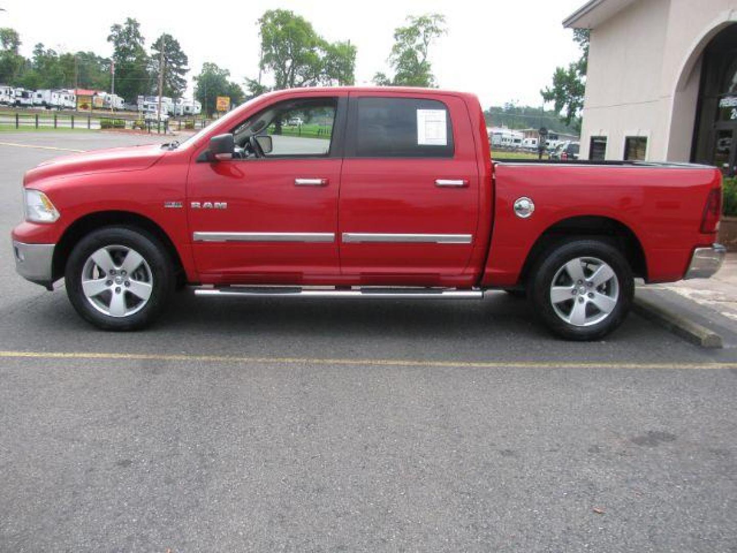 2009 Red Dodge Ram 1500 CREW CAB PICKUP 4-DR (1D3HV13T39J) with an 5.7L V8 OHV 16V engine, 5-Speed Automatic transmission, located at 2443 Albert Pike, Hot Springs, AR, 71913, (501) 623-6255, 34.492222, -93.109993 - Photo#5