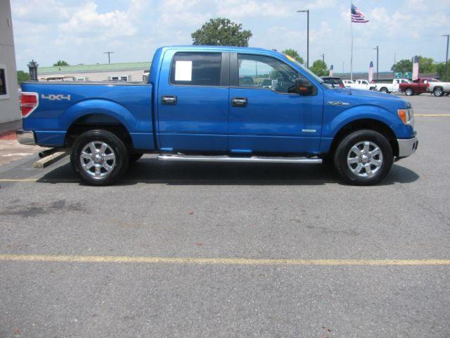 2014 Blue Ford F-150 XLT SuperCrew 5.5-ft. Bed 4WD (1FTFW1ET3EK) with an 3.5L V6 TURBO engine, 6-Speed Automatic transmission, located at 2443 Albert Pike, Hot Springs, AR, 71913, (501) 623-6255, 34.492222, -93.109993 - Photo#1