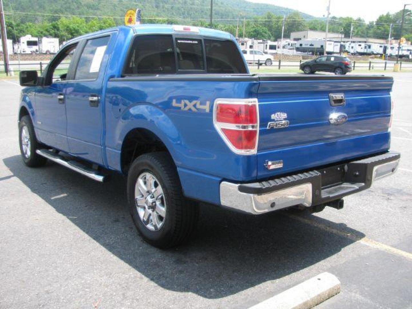 2014 Blue Ford F-150 XLT SuperCrew 5.5-ft. Bed 4WD (1FTFW1ET3EK) with an 3.5L V6 TURBO engine, 6-Speed Automatic transmission, located at 2443 Albert Pike, Hot Springs, AR, 71913, (501) 623-6255, 34.492222, -93.109993 - Photo#3