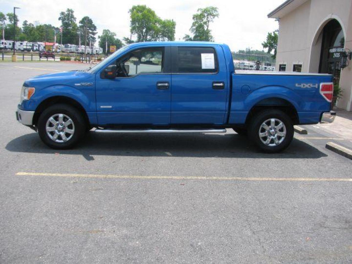 2014 Blue Ford F-150 XLT SuperCrew 5.5-ft. Bed 4WD (1FTFW1ET3EK) with an 3.5L V6 TURBO engine, 6-Speed Automatic transmission, located at 2443 Albert Pike, Hot Springs, AR, 71913, (501) 623-6255, 34.492222, -93.109993 - Photo#4