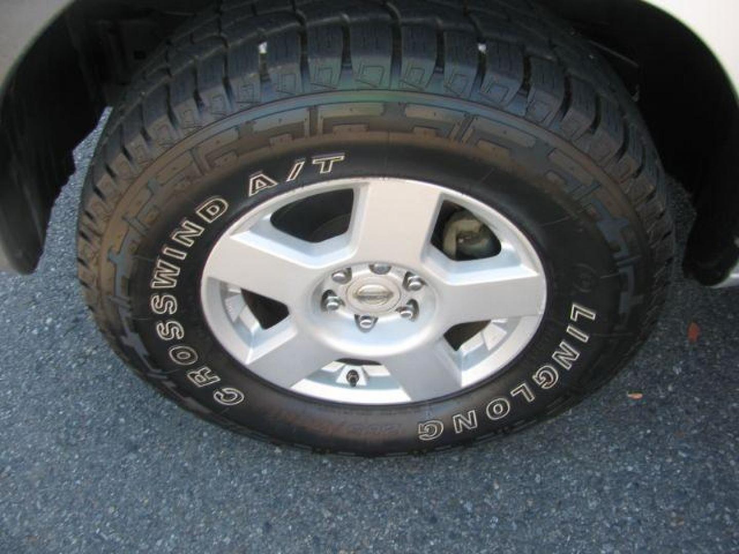 2015 Silver Nissan Xterra S 5AT 2WD (5N1AN0NU9FN) with an 4.0L V6 DOHC 24V engine, 5-Speed Automatic transmission, located at 2443 Albert Pike, Hot Springs, AR, 71913, (501) 623-6255, 34.492222, -93.109993 - Photo#6