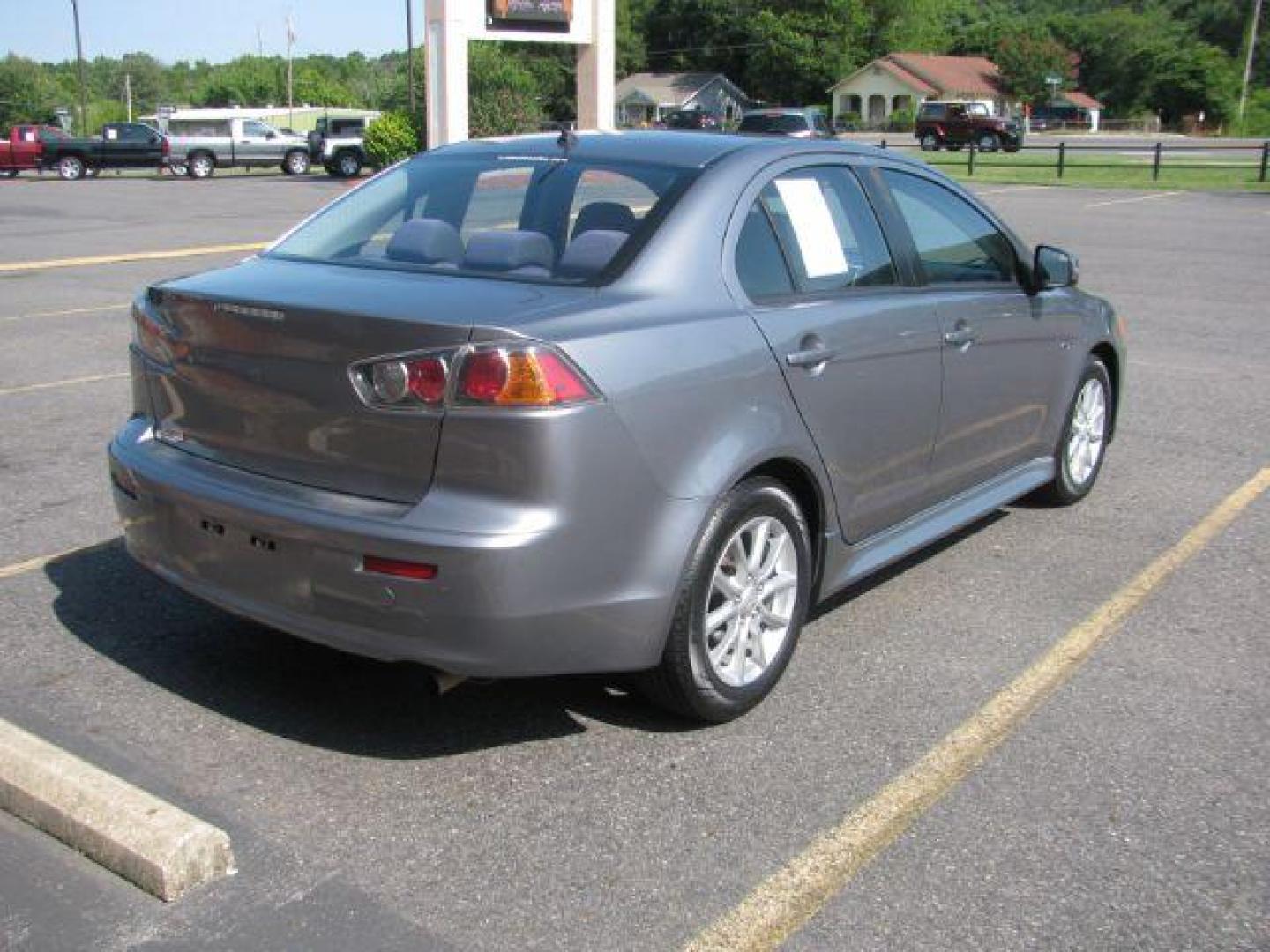 2016 Gray Mitsubishi Lancer ES CVT (JA32U2FU1GU) with an 2.0L L4 SOHC 16V engine, Continuously Variable Transmission transmission, located at 2443 Albert Pike, Hot Springs, AR, 71913, (501) 623-6255, 34.492222, -93.109993 - Photo#2