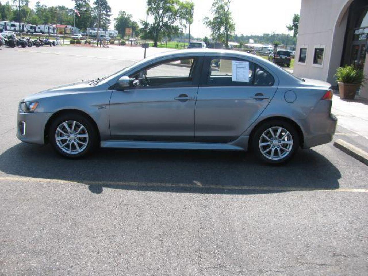 2016 Gray Mitsubishi Lancer ES CVT (JA32U2FU1GU) with an 2.0L L4 SOHC 16V engine, Continuously Variable Transmission transmission, located at 2443 Albert Pike, Hot Springs, AR, 71913, (501) 623-6255, 34.492222, -93.109993 - Photo#4