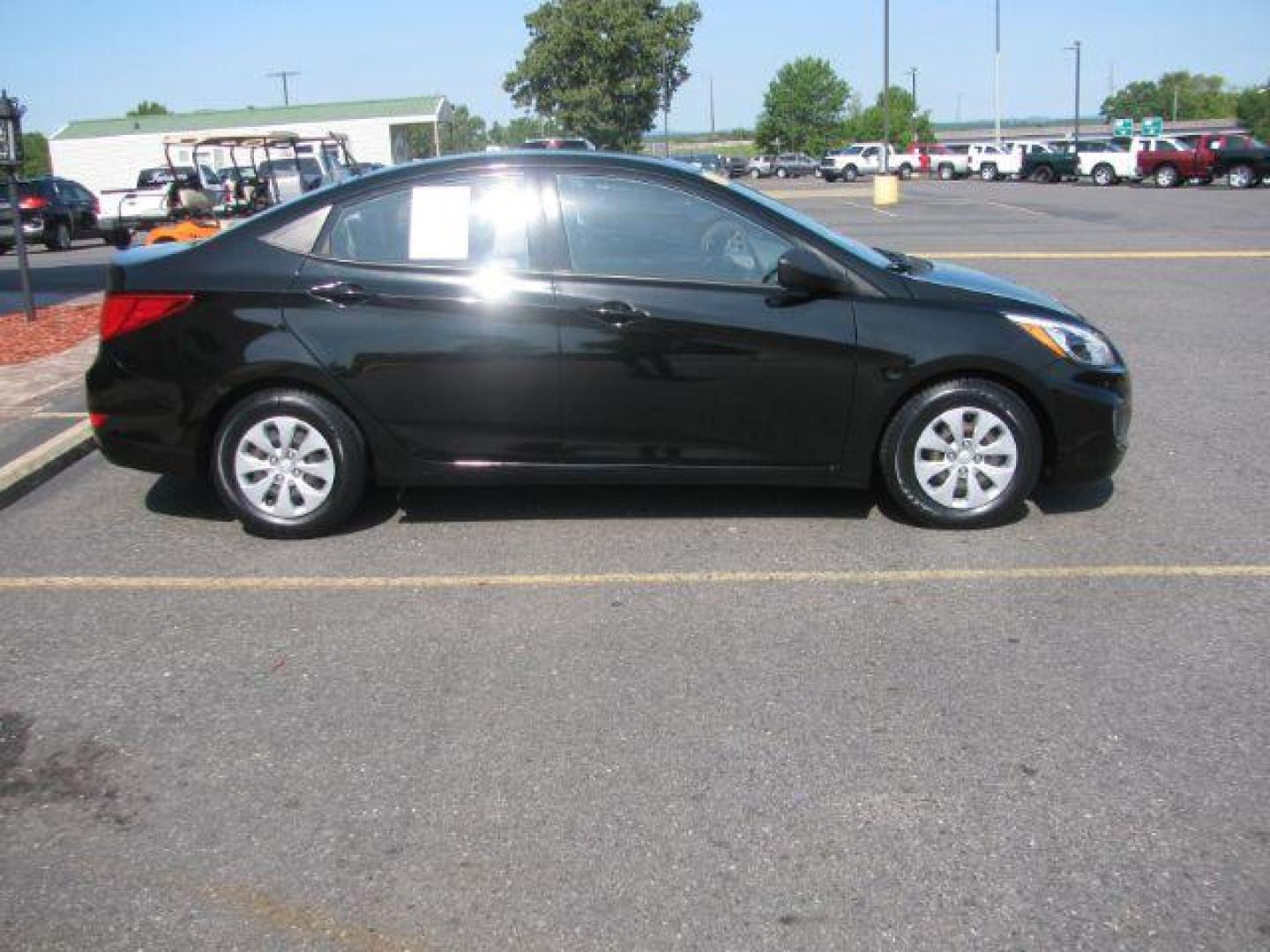 2016 Black Hyundai Accent SE 4-Door 6A (KMHCT4AE8GU) with an 1.6L L4 DOHC 16V engine, 6-Speed Automatic transmission, located at 2443 Albert Pike, Hot Springs, AR, 71913, (501) 623-6255, 34.492222, -93.109993 - Photo#1