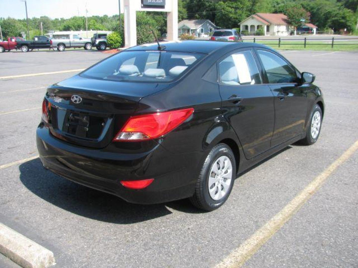 2016 Black Hyundai Accent SE 4-Door 6A (KMHCT4AE8GU) with an 1.6L L4 DOHC 16V engine, 6-Speed Automatic transmission, located at 2443 Albert Pike, Hot Springs, AR, 71913, (501) 623-6255, 34.492222, -93.109993 - Photo#2