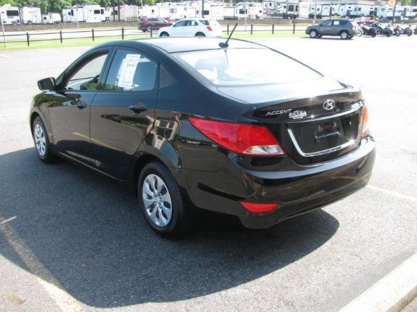 2016 Black Hyundai Accent SE 4-Door 6A (KMHCT4AE8GU) with an 1.6L L4 DOHC 16V engine, 6-Speed Automatic transmission, located at 2443 Albert Pike, Hot Springs, AR, 71913, (501) 623-6255, 34.492222, -93.109993 - Photo#3