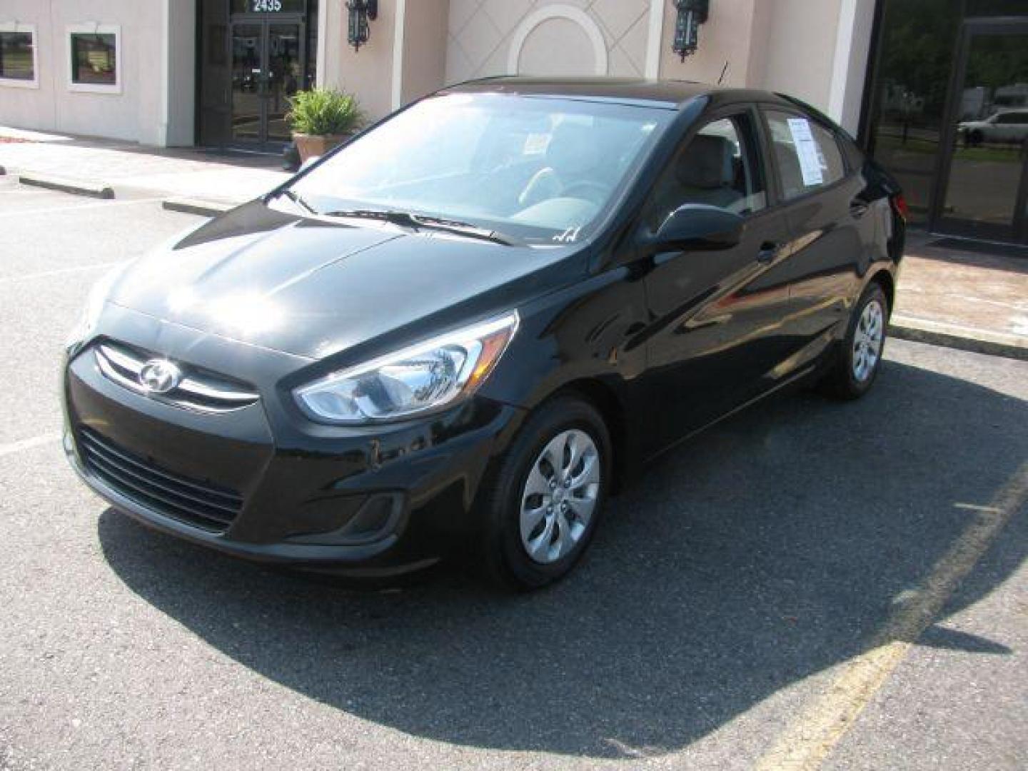 2016 Black Hyundai Accent SE 4-Door 6A (KMHCT4AE8GU) with an 1.6L L4 DOHC 16V engine, 6-Speed Automatic transmission, located at 2443 Albert Pike, Hot Springs, AR, 71913, (501) 623-6255, 34.492222, -93.109993 - Photo#5