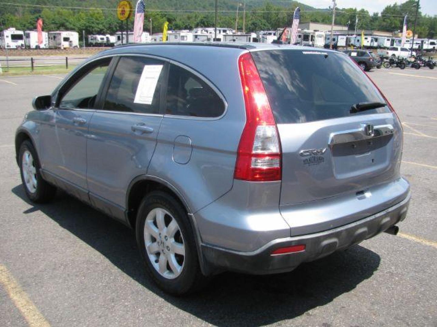 2008 Blue Honda CR-V EX-L 2WD AT (JHLRE38718C) with an 2.4L L4 DOHC 16V engine, 5-Speed Automatic transmission, located at 2443 Albert Pike, Hot Springs, AR, 71913, (501) 623-6255, 34.492222, -93.109993 - Photo#2