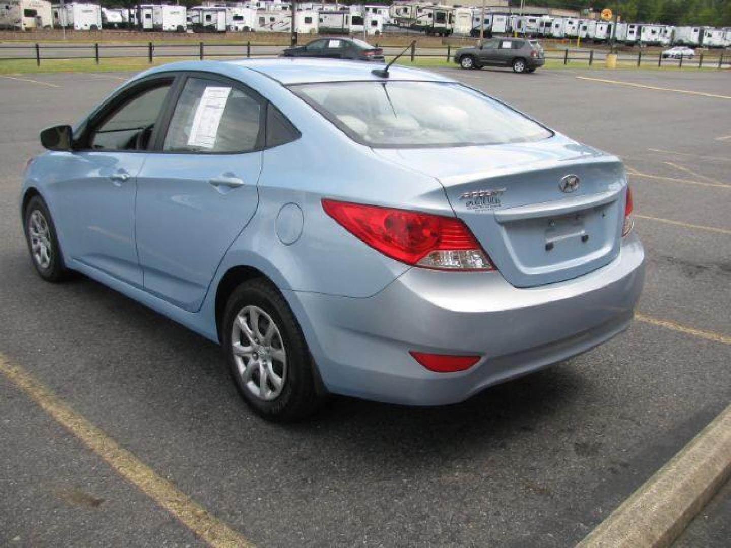 2013 Blue Hyundai Accent GLS 4-Door (KMHCT4AE9DU) with an 1.6L L4 DOHC 16V engine, located at 2443 Albert Pike, Hot Springs, AR, 71913, (501) 623-6255, 34.492222, -93.109993 - Photo#2