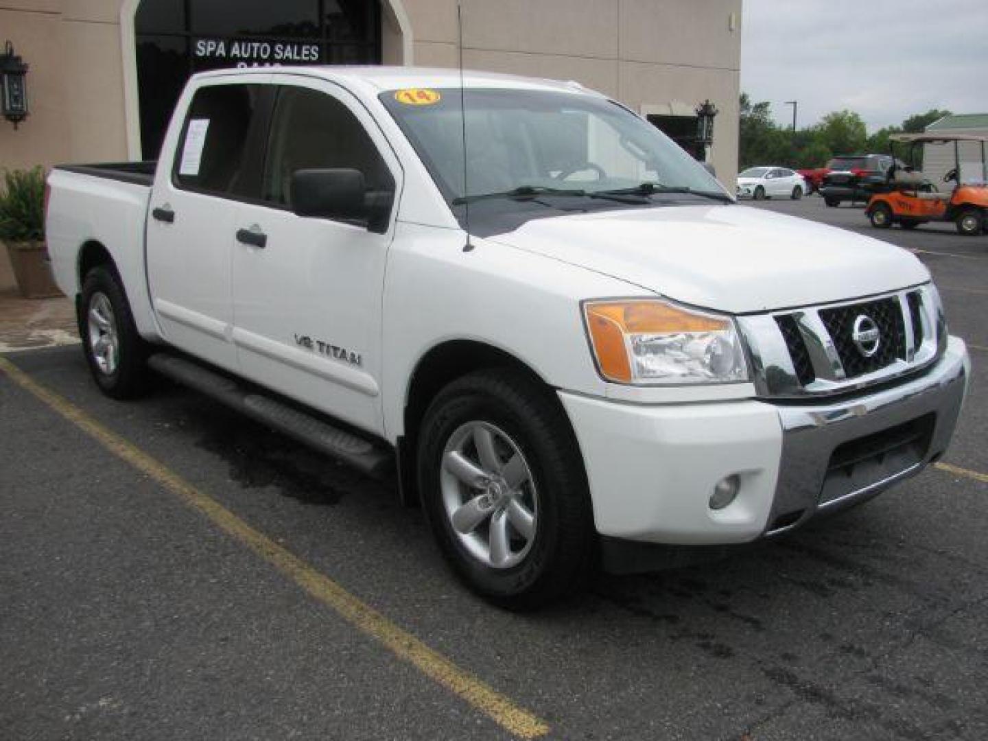 2014 White Nissan Titan S Crew Cab 2WD (1N6BA0EDXEN) with an 5.6L V8 DOHC 32V FFV engine, 5-Speed Automatic transmission, located at 2443 Albert Pike, Hot Springs, AR, 71913, (501) 623-6255, 34.492222, -93.109993 - Photo#6