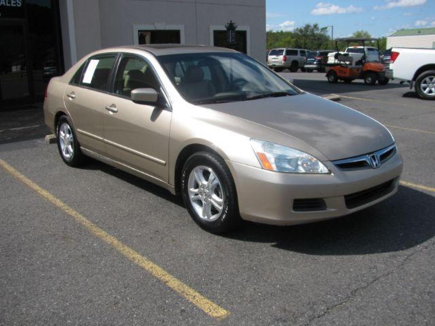 2006 Gold Honda Accord EX Sedan AT w/ Leather and XM Radio (1HGCM56826A) with an 2.4L L4 DOHC 16V engine, 5-Speed Automatic transmission, located at 2443 Albert Pike, Hot Springs, AR, 71913, (501) 623-6255, 34.492222, -93.109993 - Photo#0