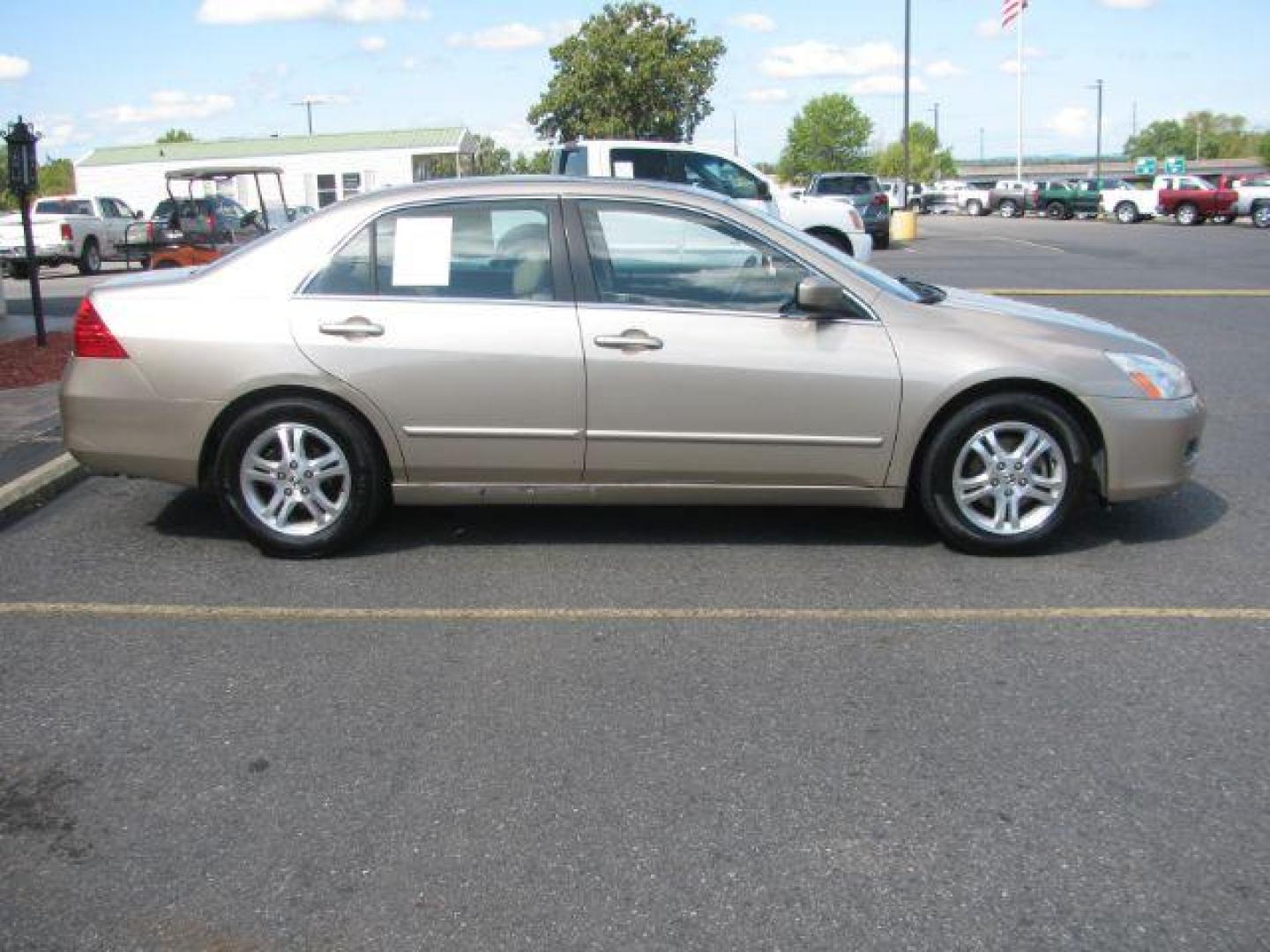 2006 Gold Honda Accord EX Sedan AT w/ Leather and XM Radio (1HGCM56826A) with an 2.4L L4 DOHC 16V engine, 5-Speed Automatic transmission, located at 2443 Albert Pike, Hot Springs, AR, 71913, (501) 623-6255, 34.492222, -93.109993 - Photo#1