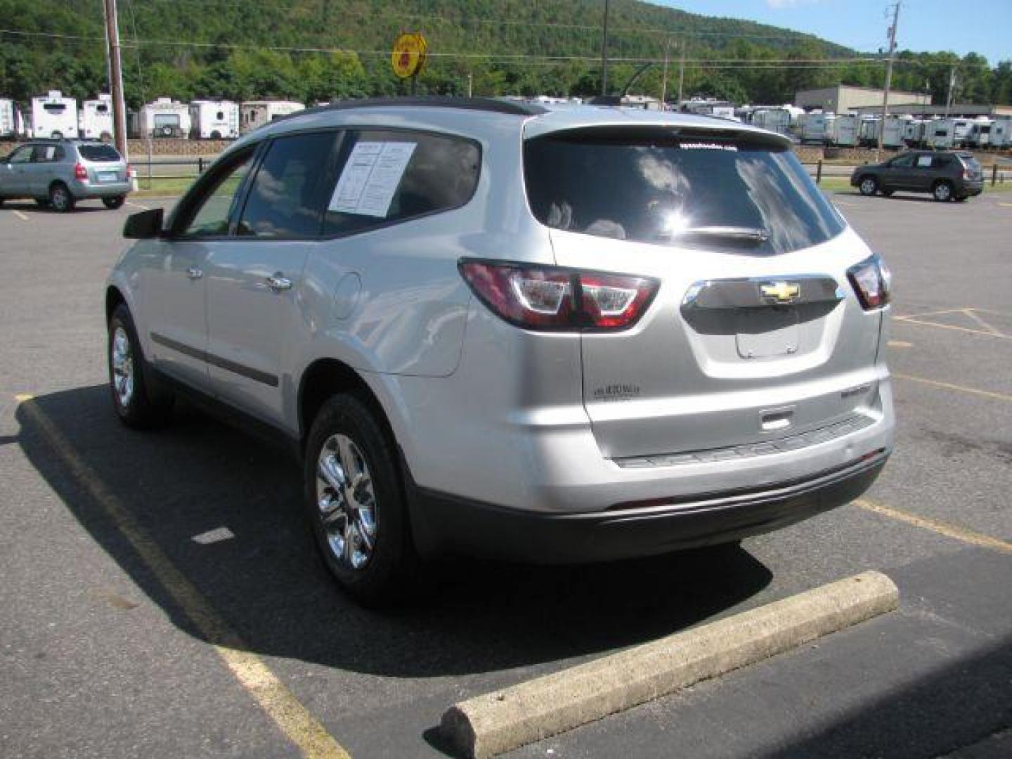 2017 Silver Chevrolet Traverse LS FWD (1GNKRFKD1HJ) with an 3.6L V6 DOHC 24V engine, 6-Speed Automatic transmission, located at 2443 Albert Pike, Hot Springs, AR, 71913, (501) 623-6255, 34.492222, -93.109993 - Photo#3