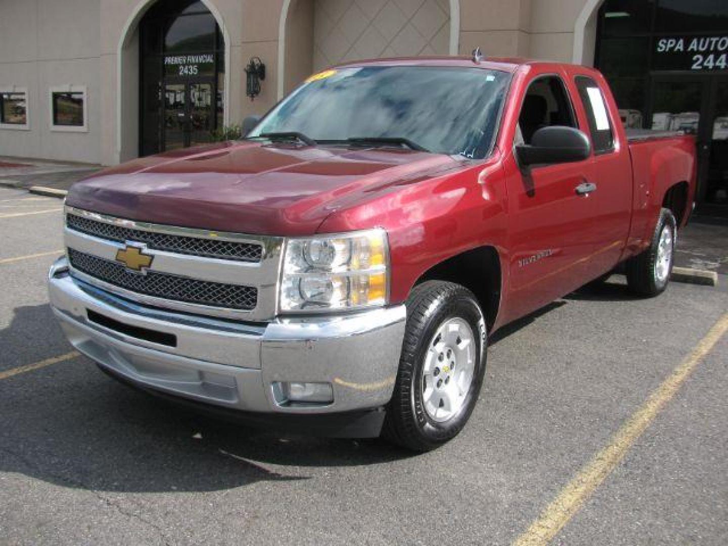 2013 Maroon Chevrolet Silverado 1500 LT Ext. Cab 2WD (1GCRCSE06DZ) with an 5.3L V8 OHV 16V FFV engine, located at 2443 Albert Pike, Hot Springs, AR, 71913, (501) 623-6255, 34.492222, -93.109993 - Photo#0