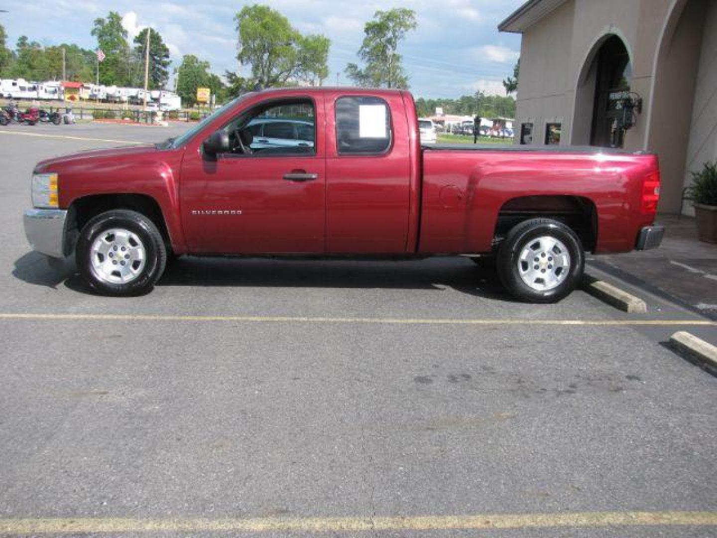 2013 Maroon Chevrolet Silverado 1500 LT Ext. Cab 2WD (1GCRCSE06DZ) with an 5.3L V8 OHV 16V FFV engine, located at 2443 Albert Pike, Hot Springs, AR, 71913, (501) 623-6255, 34.492222, -93.109993 - Photo#1