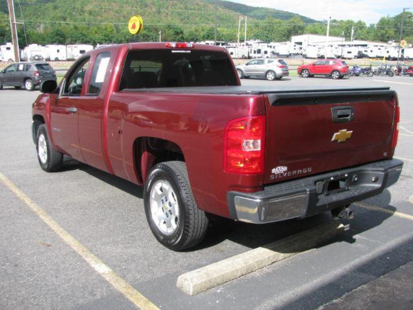 2013 Maroon Chevrolet Silverado 1500 LT Ext. Cab 2WD (1GCRCSE06DZ) with an 5.3L V8 OHV 16V FFV engine, located at 2443 Albert Pike, Hot Springs, AR, 71913, (501) 623-6255, 34.492222, -93.109993 - Photo#2