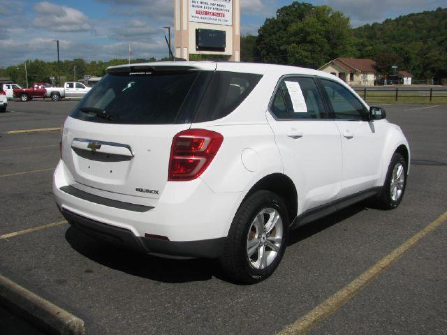 2016 White Chevrolet Equinox LS 2WD (2GNALBEK0G1) with an 2.4L L4 DOHC 16V FFV engine, 6-Speed Automatic transmission, located at 2443 Albert Pike, Hot Springs, AR, 71913, (501) 623-6255, 34.492222, -93.109993 - Photo#2