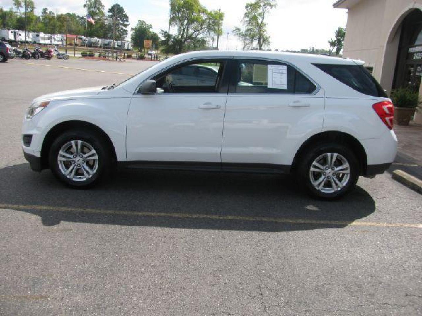 2016 White Chevrolet Equinox LS 2WD (2GNALBEK0G1) with an 2.4L L4 DOHC 16V FFV engine, 6-Speed Automatic transmission, located at 2443 Albert Pike, Hot Springs, AR, 71913, (501) 623-6255, 34.492222, -93.109993 - Photo#4