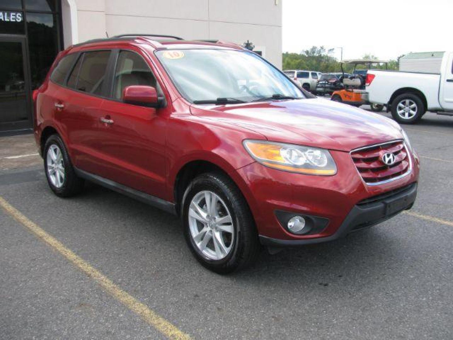 2010 Maroon Hyundai Santa Fe Limited 2.4 FWD (5NMSK3AB0AH) with an 2.4L L4 DOHC 16V engine, 6-Speed Automatic transmission, located at 2443 Albert Pike, Hot Springs, AR, 71913, (501) 623-6255, 34.492222, -93.109993 - Photo#0