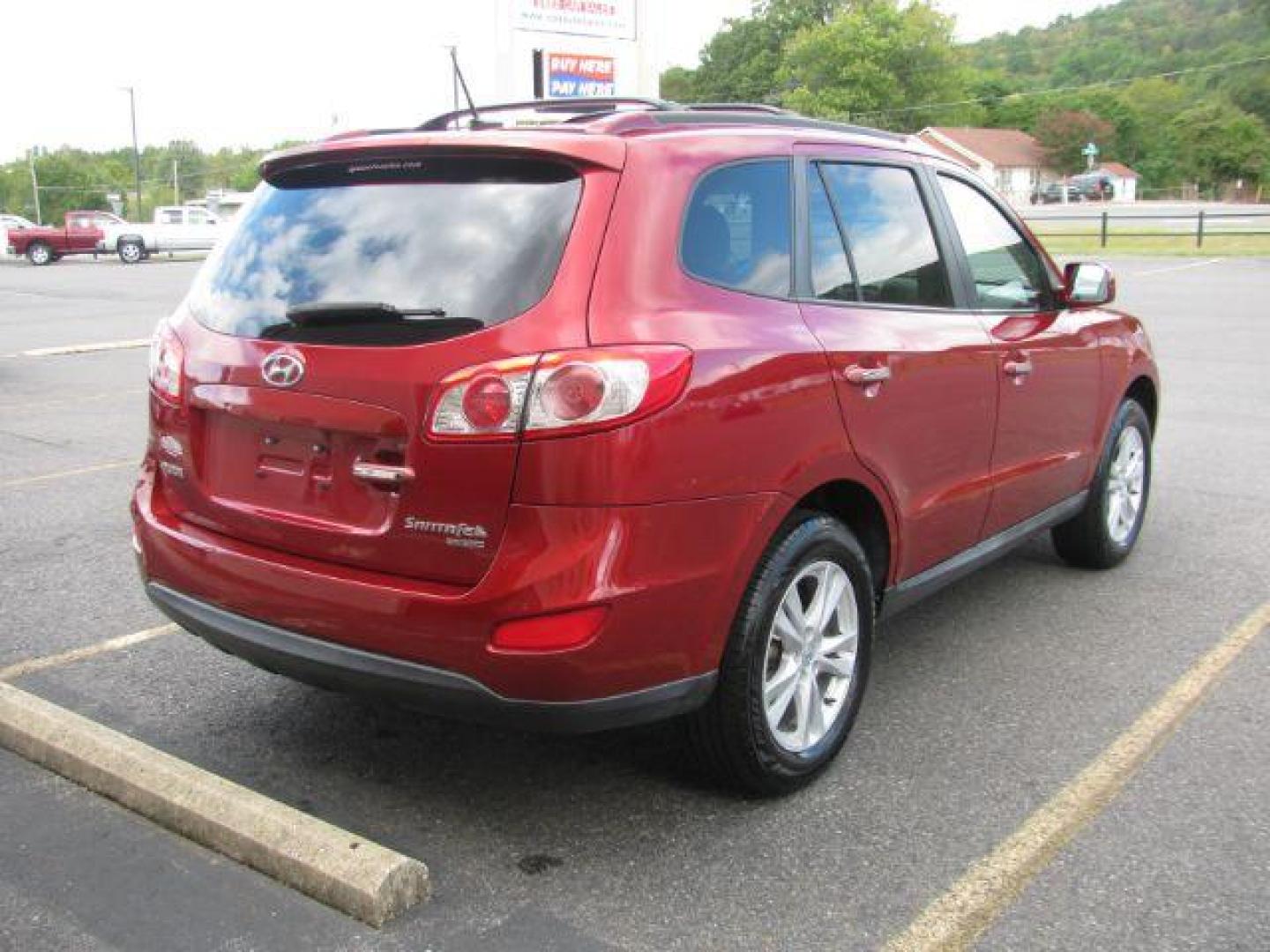 2010 Maroon Hyundai Santa Fe Limited 2.4 FWD (5NMSK3AB0AH) with an 2.4L L4 DOHC 16V engine, 6-Speed Automatic transmission, located at 2443 Albert Pike, Hot Springs, AR, 71913, (501) 623-6255, 34.492222, -93.109993 - Photo#2