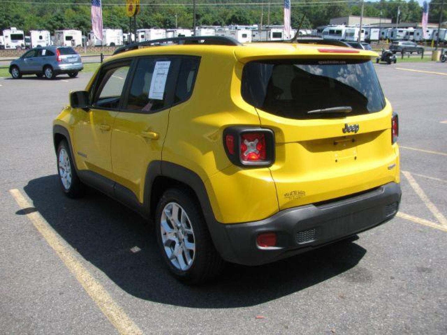 2015 Yellow Jeep Renegade Latitude FWD (ZACCJABT0FP) with an 2.4L L4 DOHC 16V engine, automatic transmission, located at 2443 Albert Pike, Hot Springs, AR, 71913, (501) 623-6255, 34.492222, -93.109993 - Photo#3