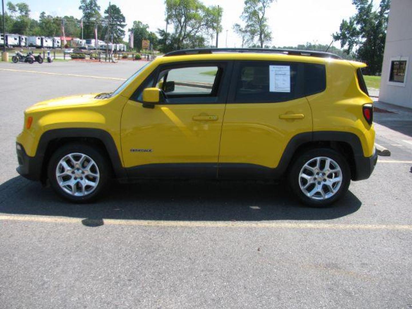 2015 Yellow Jeep Renegade Latitude FWD (ZACCJABT0FP) with an 2.4L L4 DOHC 16V engine, automatic transmission, located at 2443 Albert Pike, Hot Springs, AR, 71913, (501) 623-6255, 34.492222, -93.109993 - Photo#4