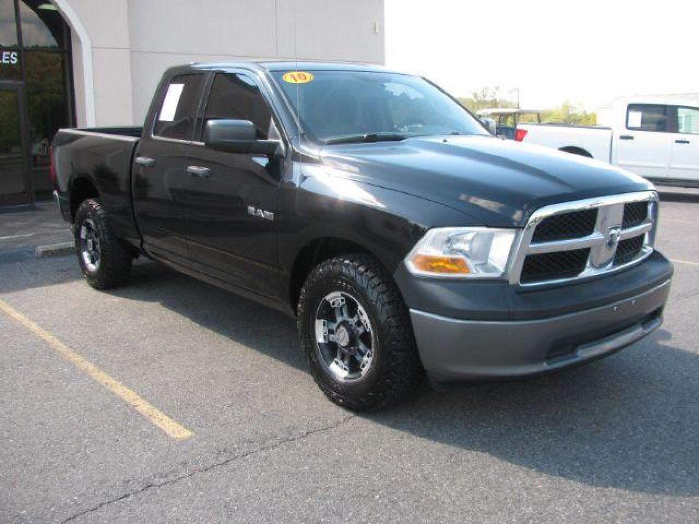 2010 Black RAM 1500 ST Quad Cab 4WD (1D7RV1GP4AS) with an 4.7L V8 SOHC 16V engine, 5-Speed Automatic transmission, located at 2443 Albert Pike, Hot Springs, AR, 71913, (501) 623-6255, 34.492222, -93.109993 - Photo#0