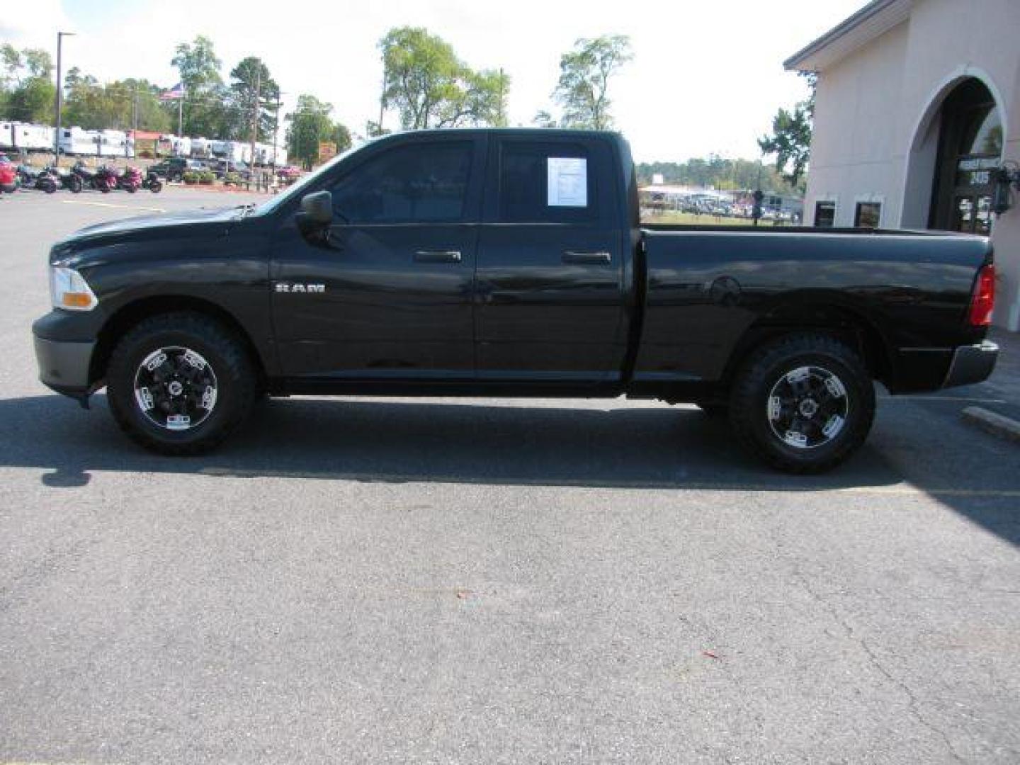 2010 Black RAM 1500 ST Quad Cab 4WD (1D7RV1GP4AS) with an 4.7L V8 SOHC 16V engine, 5-Speed Automatic transmission, located at 2443 Albert Pike, Hot Springs, AR, 71913, (501) 623-6255, 34.492222, -93.109993 - Photo#5