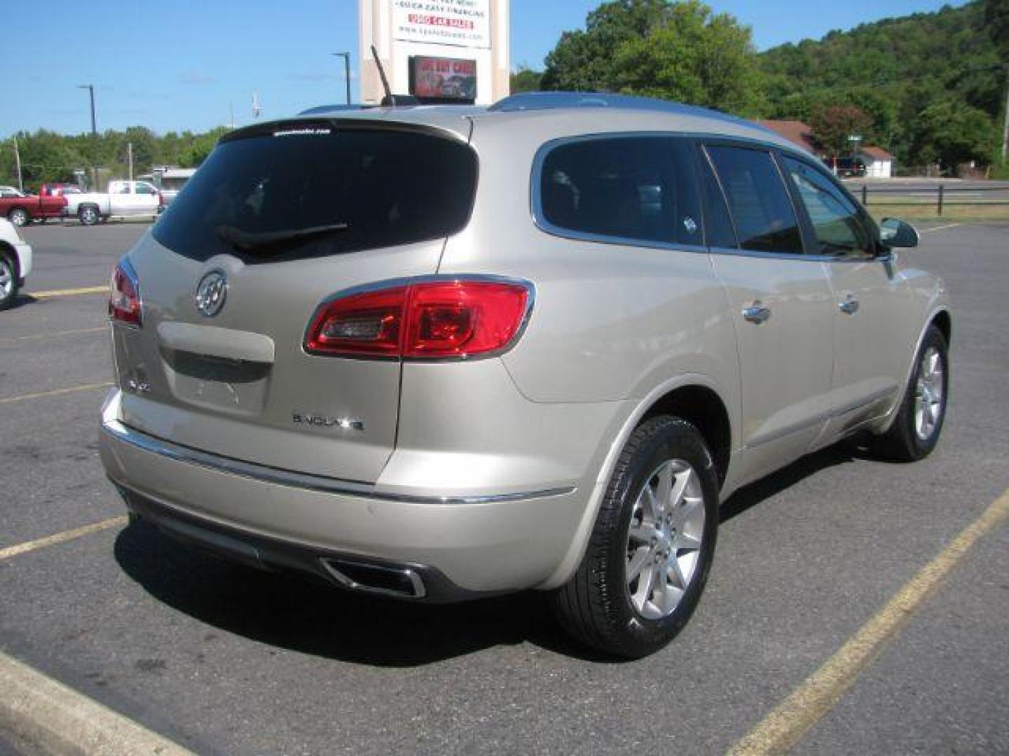 2016 Tan Buick Enclave Leather FWD (5GAKRBKD7GJ) with an 3.6L V6 DOHC 24V engine, 6-Speed Automatic Overdrive transmission, located at 2443 Albert Pike, Hot Springs, AR, 71913, (501) 623-6255, 34.492222, -93.109993 - Photo#2