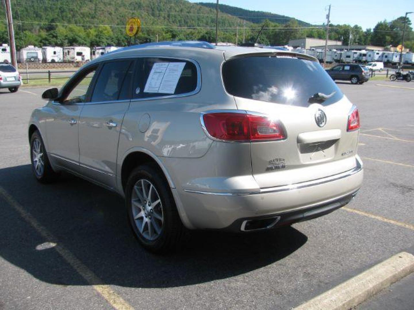 2016 Tan Buick Enclave Leather FWD (5GAKRBKD7GJ) with an 3.6L V6 DOHC 24V engine, 6-Speed Automatic Overdrive transmission, located at 2443 Albert Pike, Hot Springs, AR, 71913, (501) 623-6255, 34.492222, -93.109993 - Photo#3