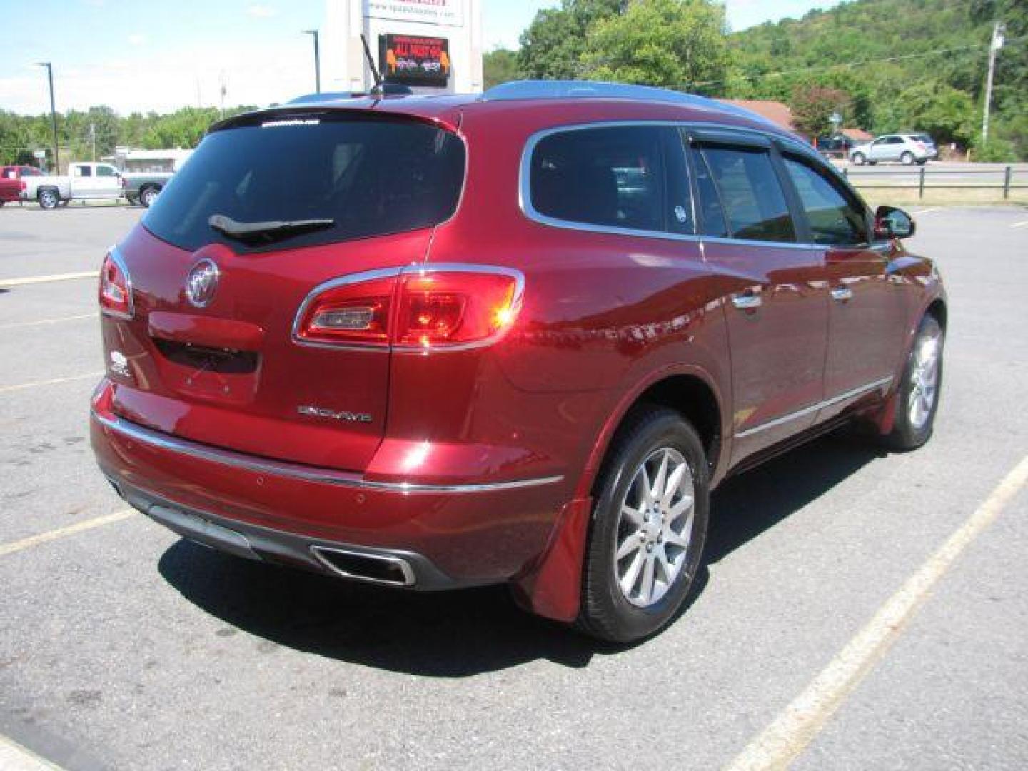 2016 Maroon Buick Enclave Leather FWD (5GAKRBKD2GJ) with an 3.6L V6 DOHC 24V engine, 6-Speed Automatic Overdrive transmission, located at 2443 Albert Pike, Hot Springs, AR, 71913, (501) 623-6255, 34.492222, -93.109993 - Photo#2