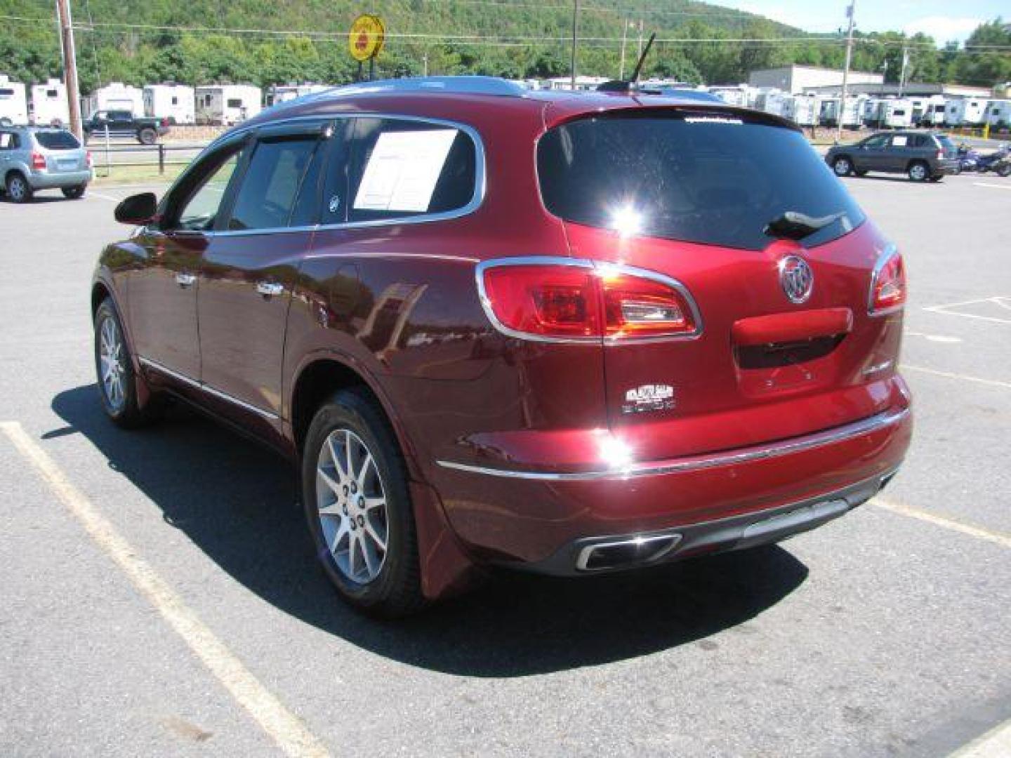 2016 Maroon Buick Enclave Leather FWD (5GAKRBKD2GJ) with an 3.6L V6 DOHC 24V engine, 6-Speed Automatic Overdrive transmission, located at 2443 Albert Pike, Hot Springs, AR, 71913, (501) 623-6255, 34.492222, -93.109993 - Photo#3