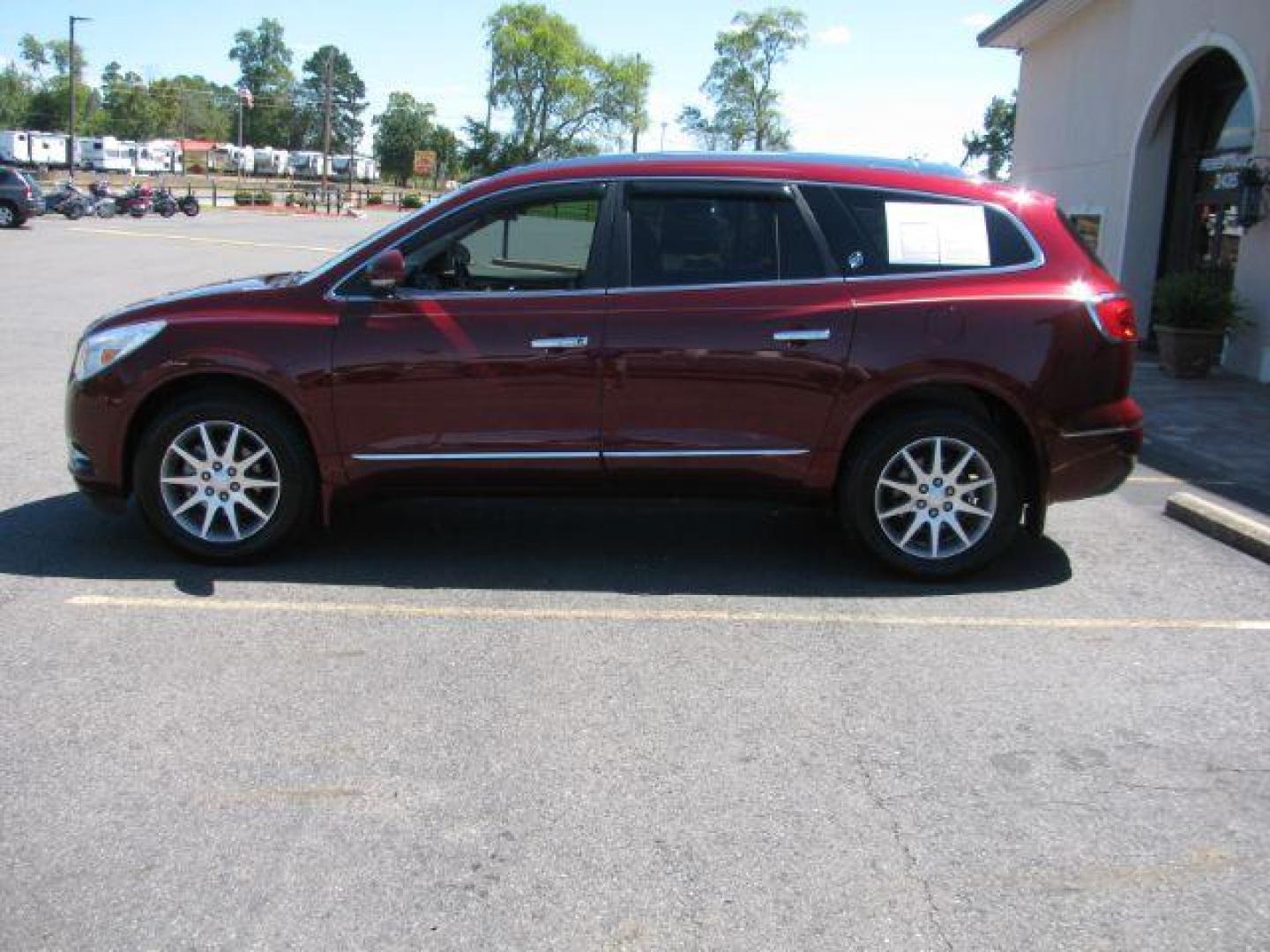 2016 Maroon Buick Enclave Leather FWD (5GAKRBKD2GJ) with an 3.6L V6 DOHC 24V engine, 6-Speed Automatic Overdrive transmission, located at 2443 Albert Pike, Hot Springs, AR, 71913, (501) 623-6255, 34.492222, -93.109993 - Photo#4