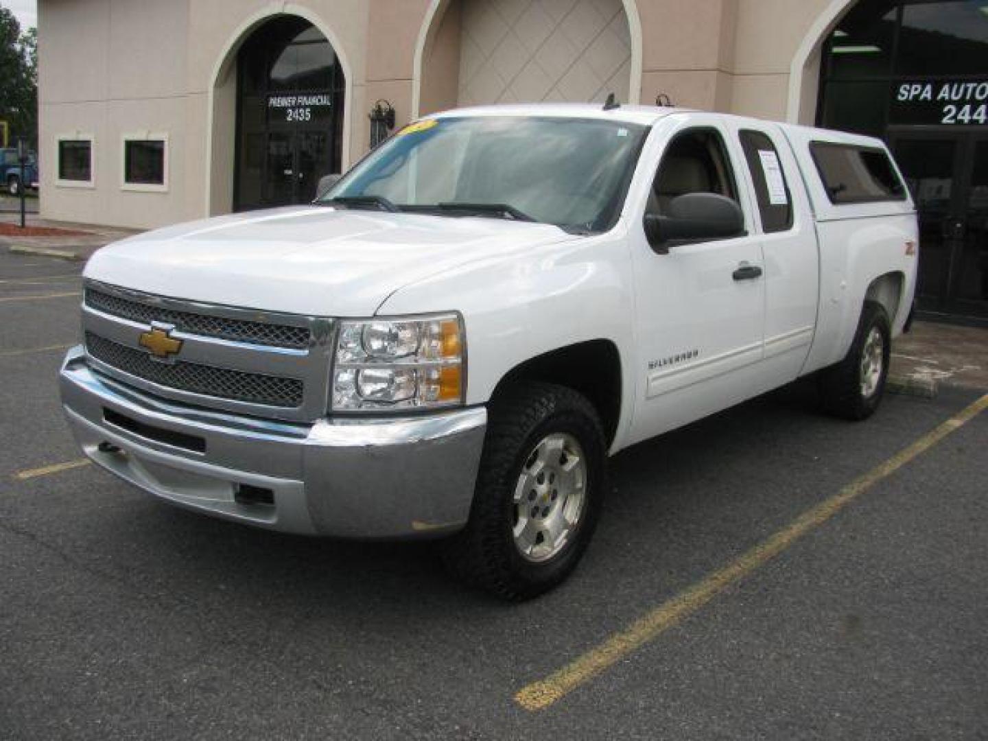 2013 White Chevrolet Silverado 1500 LT Ext. Cab 4WD (1GCRKSE74DZ) with an 5.3L V8 OHV 16V FFV engine, located at 2443 Albert Pike, Hot Springs, AR, 71913, (501) 623-6255, 34.492222, -93.109993 - Photo#0