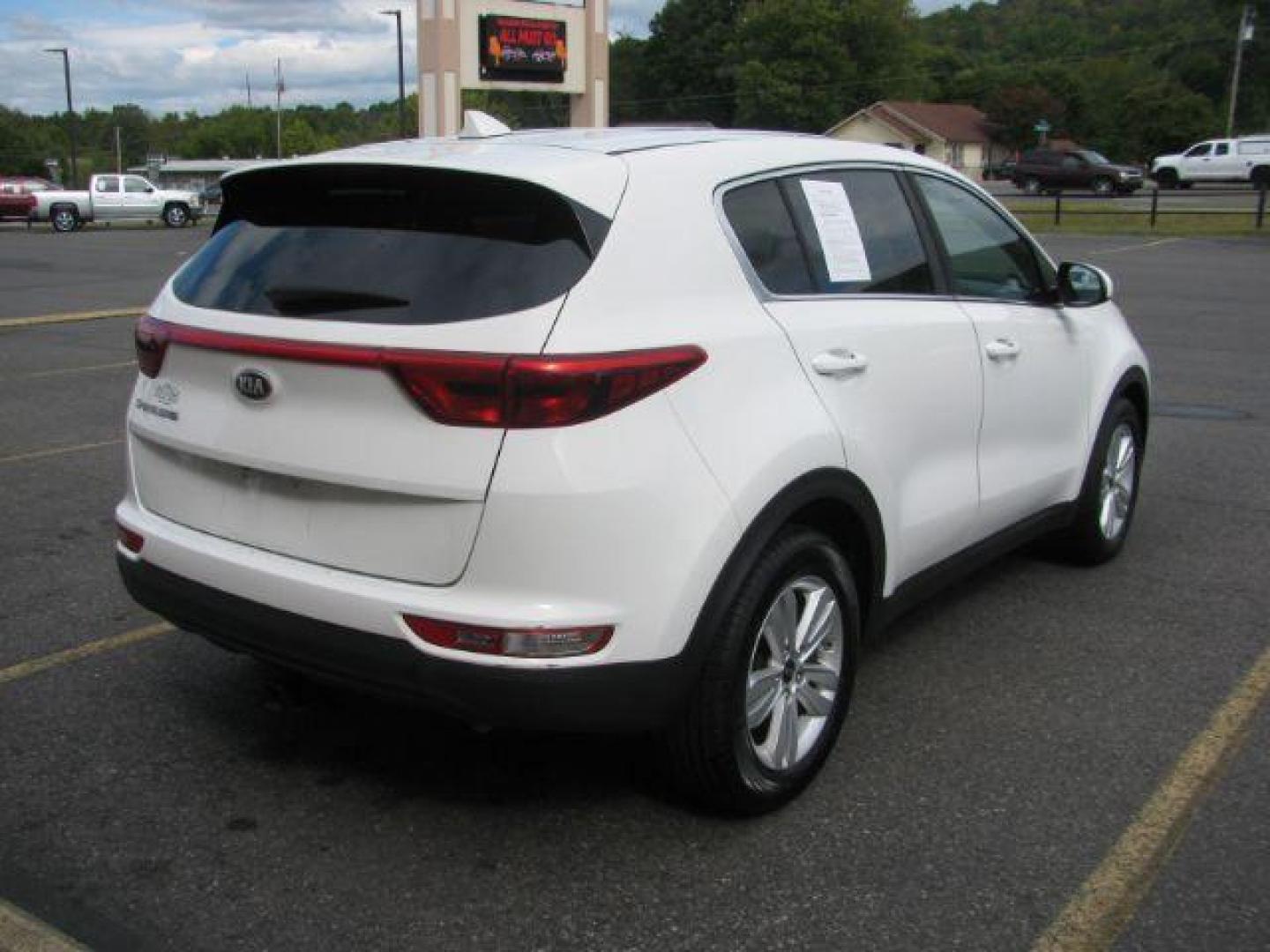 2018 White Kia Sportage LX FWD (KNDPM3AC0J7) with an 2.4L V6 DOHC 24V engine, 6-Speed Automatic transmission, located at 2443 Albert Pike, Hot Springs, AR, 71913, (501) 623-6255, 34.492222, -93.109993 - Photo#2