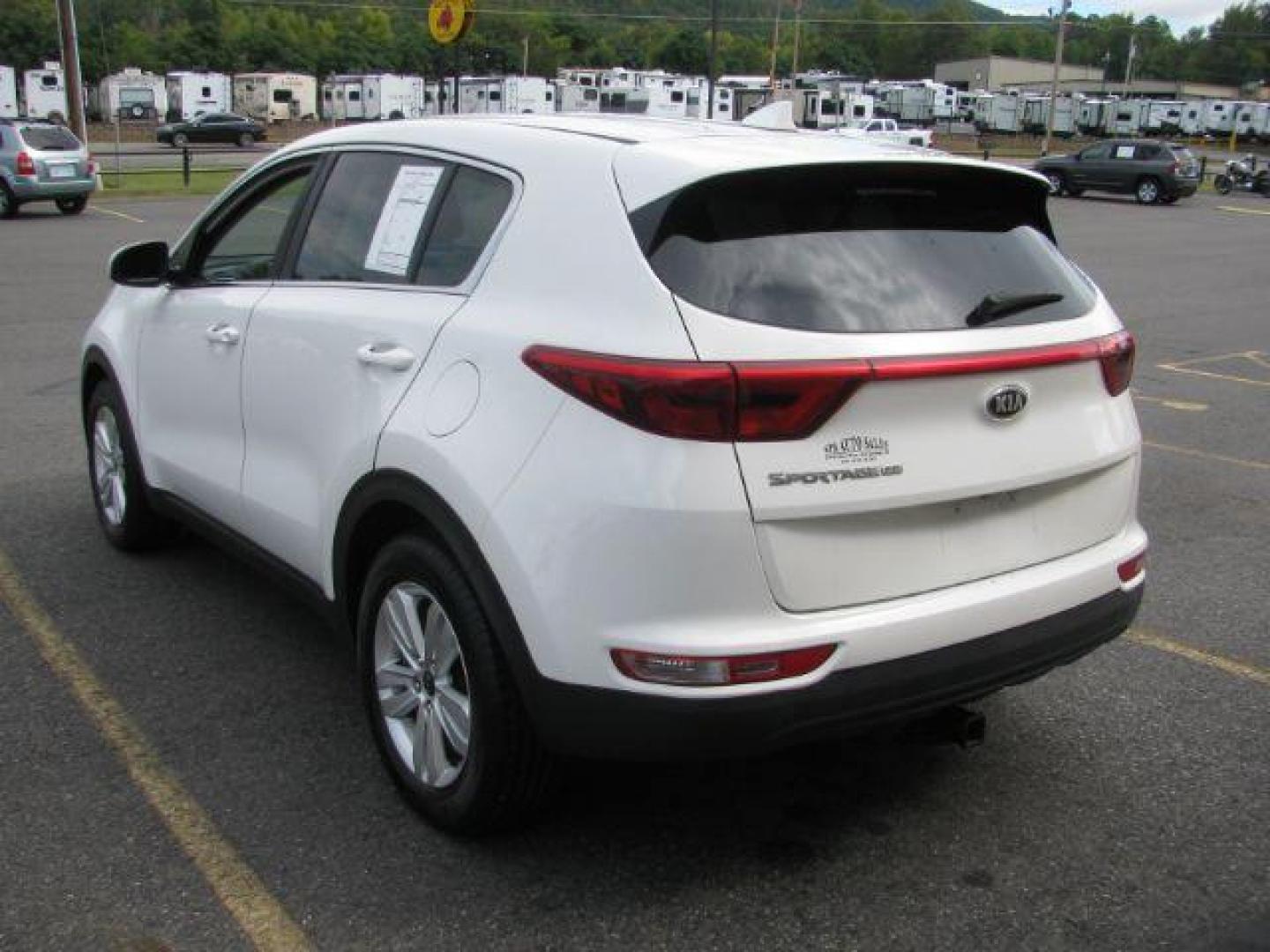 2018 White Kia Sportage LX FWD (KNDPM3AC0J7) with an 2.4L V6 DOHC 24V engine, 6-Speed Automatic transmission, located at 2443 Albert Pike, Hot Springs, AR, 71913, (501) 623-6255, 34.492222, -93.109993 - Photo#3