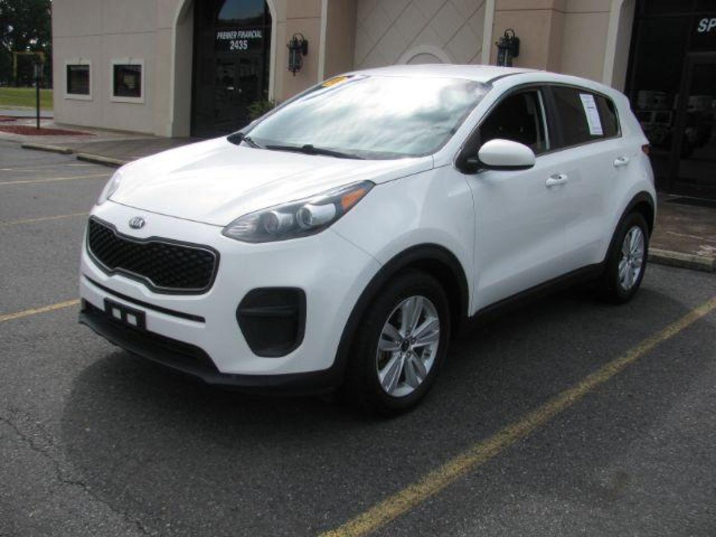 2018 White Kia Sportage LX FWD (KNDPM3AC0J7) with an 2.4L V6 DOHC 24V engine, 6-Speed Automatic transmission, located at 2443 Albert Pike, Hot Springs, AR, 71913, (501) 623-6255, 34.492222, -93.109993 - Photo#5