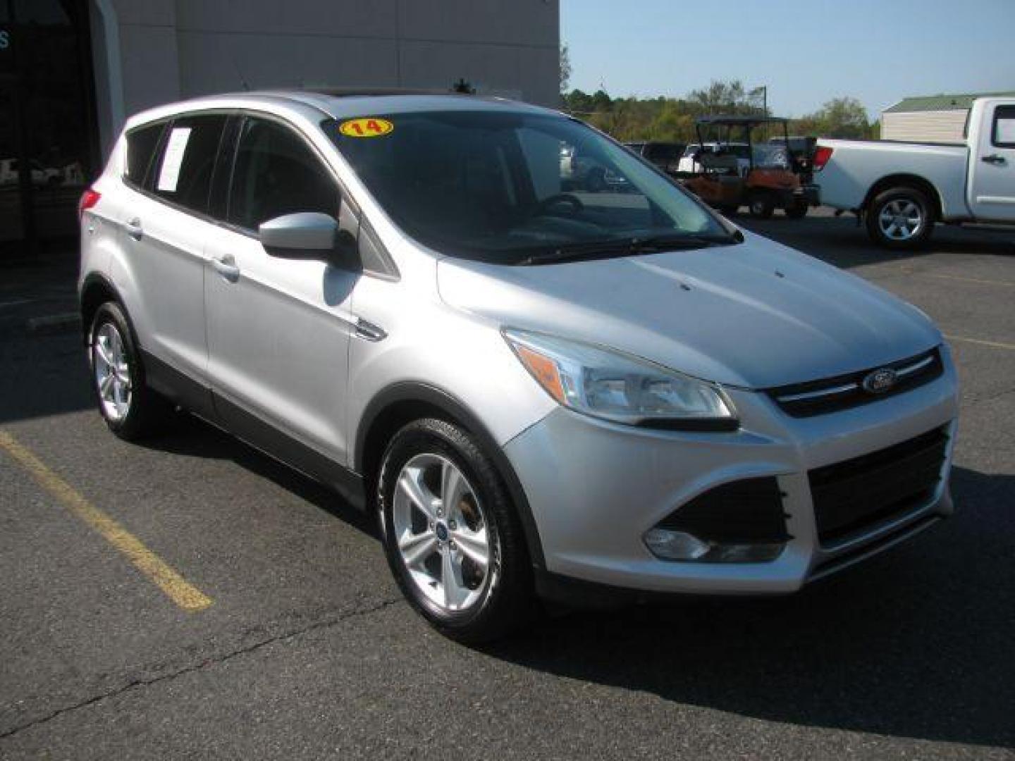 2014 Silver Ford Escape SE FWD (1FMCU0GX0EU) with an 1.6L L4 DOHC 16V engine, 6-Speed Automatic transmission, located at 2443 Albert Pike, Hot Springs, AR, 71913, (501) 623-6255, 34.492222, -93.109993 - Photo#0