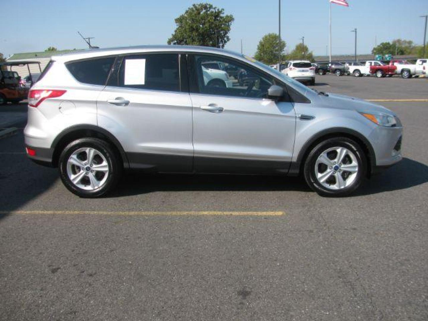 2014 Silver Ford Escape SE FWD (1FMCU0GX0EU) with an 1.6L L4 DOHC 16V engine, 6-Speed Automatic transmission, located at 2443 Albert Pike, Hot Springs, AR, 71913, (501) 623-6255, 34.492222, -93.109993 - Photo#1