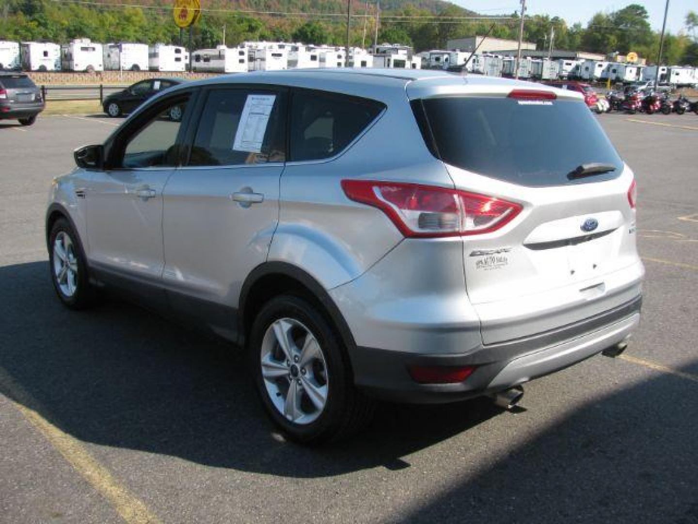 2014 Silver Ford Escape SE FWD (1FMCU0GX0EU) with an 1.6L L4 DOHC 16V engine, 6-Speed Automatic transmission, located at 2443 Albert Pike, Hot Springs, AR, 71913, (501) 623-6255, 34.492222, -93.109993 - Photo#3