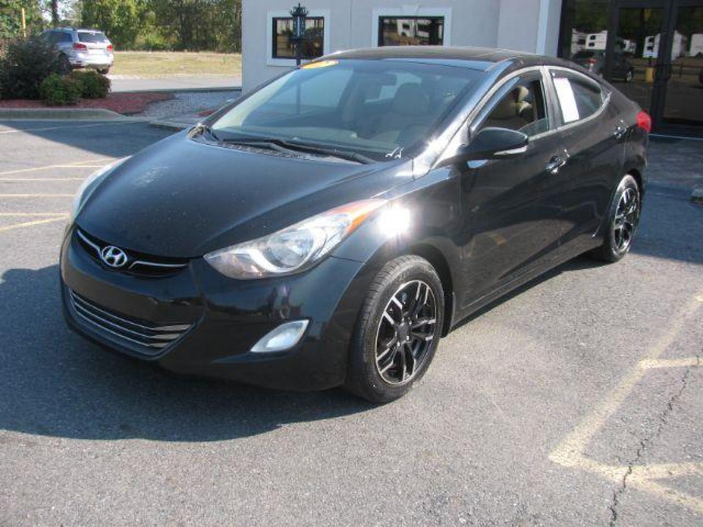 2012 Black Hyundai Elantra Limited (5NPDH4AE2CH) with an 1.8L L4 DOHC 16V engine, 6-Speed Automatic transmission, located at 2443 Albert Pike, Hot Springs, AR, 71913, (501) 623-6255, 34.492222, -93.109993 - Photo#0