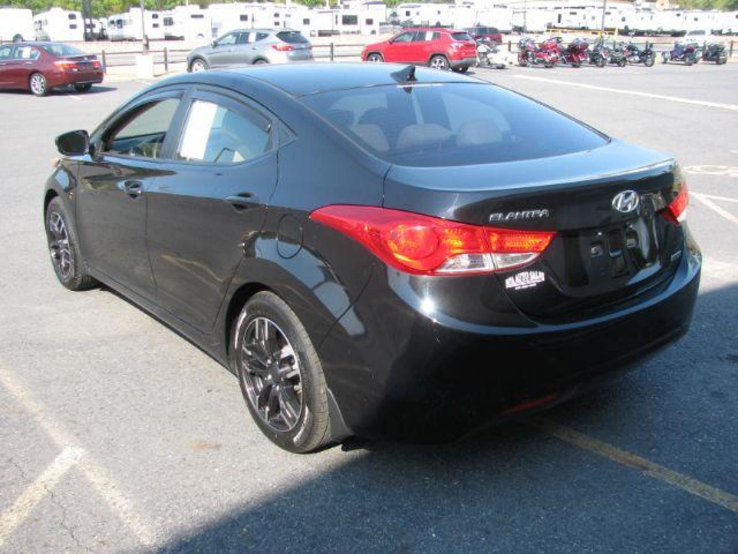 2012 Black Hyundai Elantra Limited (5NPDH4AE2CH) with an 1.8L L4 DOHC 16V engine, 6-Speed Automatic transmission, located at 2443 Albert Pike, Hot Springs, AR, 71913, (501) 623-6255, 34.492222, -93.109993 - Photo#2