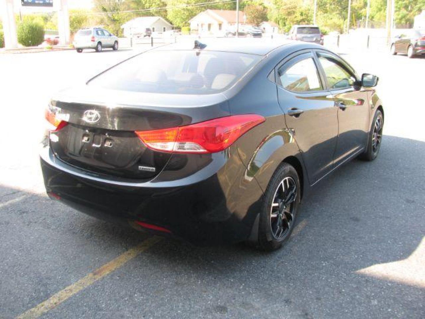 2012 Black Hyundai Elantra Limited (5NPDH4AE2CH) with an 1.8L L4 DOHC 16V engine, 6-Speed Automatic transmission, located at 2443 Albert Pike, Hot Springs, AR, 71913, (501) 623-6255, 34.492222, -93.109993 - Photo#3