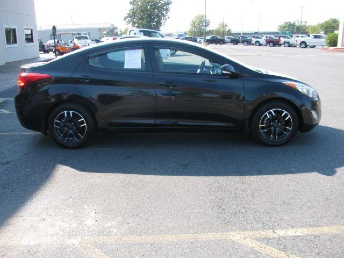 2012 Black Hyundai Elantra Limited (5NPDH4AE2CH) with an 1.8L L4 DOHC 16V engine, 6-Speed Automatic transmission, located at 2443 Albert Pike, Hot Springs, AR, 71913, (501) 623-6255, 34.492222, -93.109993 - Photo#4